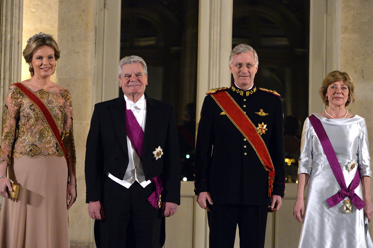 The King and Queen of the Belgians pose with President Joachim Gauck of Germany and his partner, Daniela Schadt, ahead of a banquet at Laeken on March 8, 2016 (ERIC LALMAND/AFP via Getty Images)
