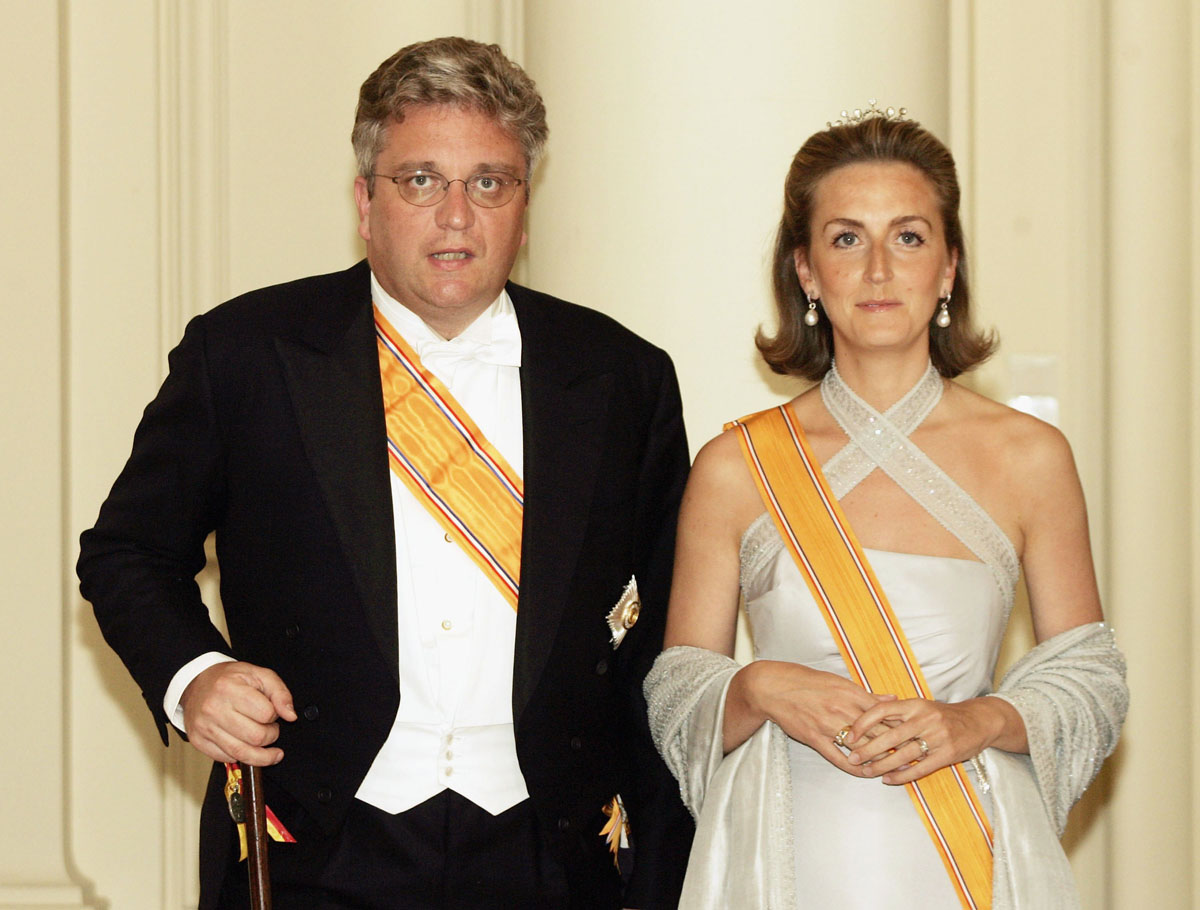 Prince Laurent and Princess Claire of Belgium attend a state banquet given at Laeken for the visiting Queen of the Netherlands on June 20, 2006 (Mark Renders/Getty Images)
