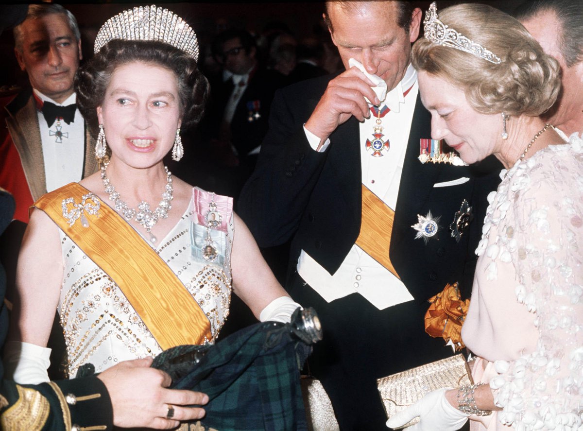 Queen Elizabeth II and Prince Philip are pictured with Grand Duchess Josephine-Charlotte during their state visit to Luxembourg, 1976 (Ron Bell/PA Images/Alamy)