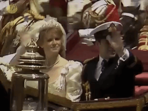 The Duke and Duchess of York ride in a carriage through London after their royal wedding, July 1986