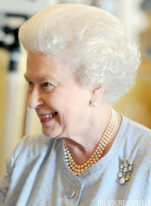 Queen Elizabeth II wears the brooch for a reception at Buckingham Palace, July 2010 (Anthony Devlin/WPA Pool/Getty Images)