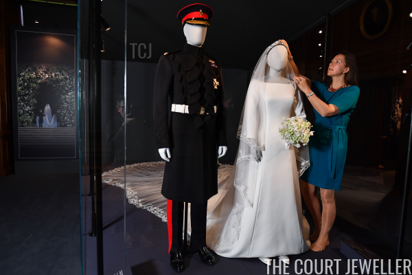 Caroline Guitaut, senior curator of the Royal Collection, prepares the "A Royal Wedding: The Duke and Duchess of Sussex" exhibition at the Palace of Holyroodhouse in Edinburgh, June 2019 (Jeff J Mitchell/Getty Images)