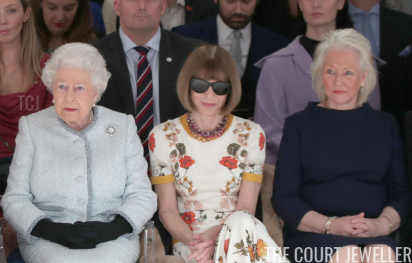 The Queen, Anna Wintour, and Angela Kelly attending a runway show during London Fashion Week, February 2018 (Yui Mok - Pool/Getty Images)