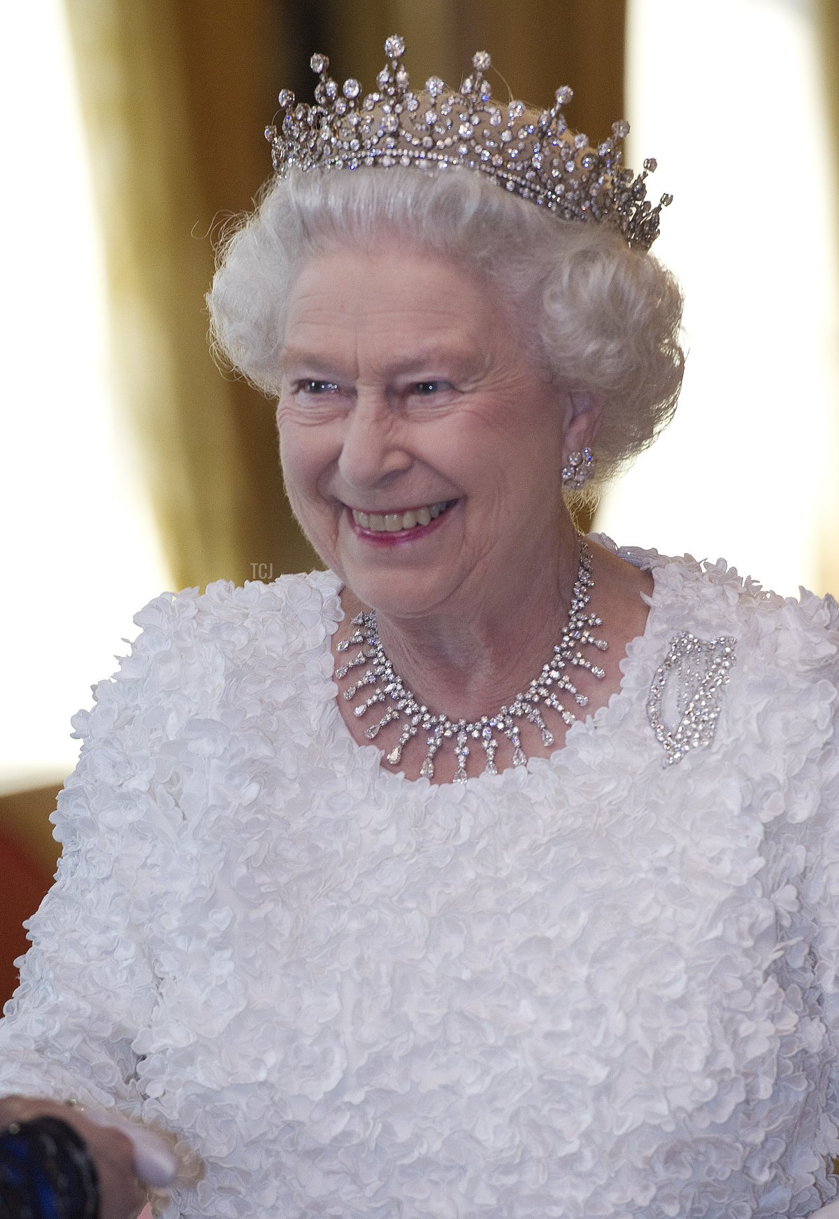 Queen Elizabeth II smiles as she attends the State Dinner on the second day of her State Visit, at Dublin Castle, on May 18, 2011 in Dublin, Ireland