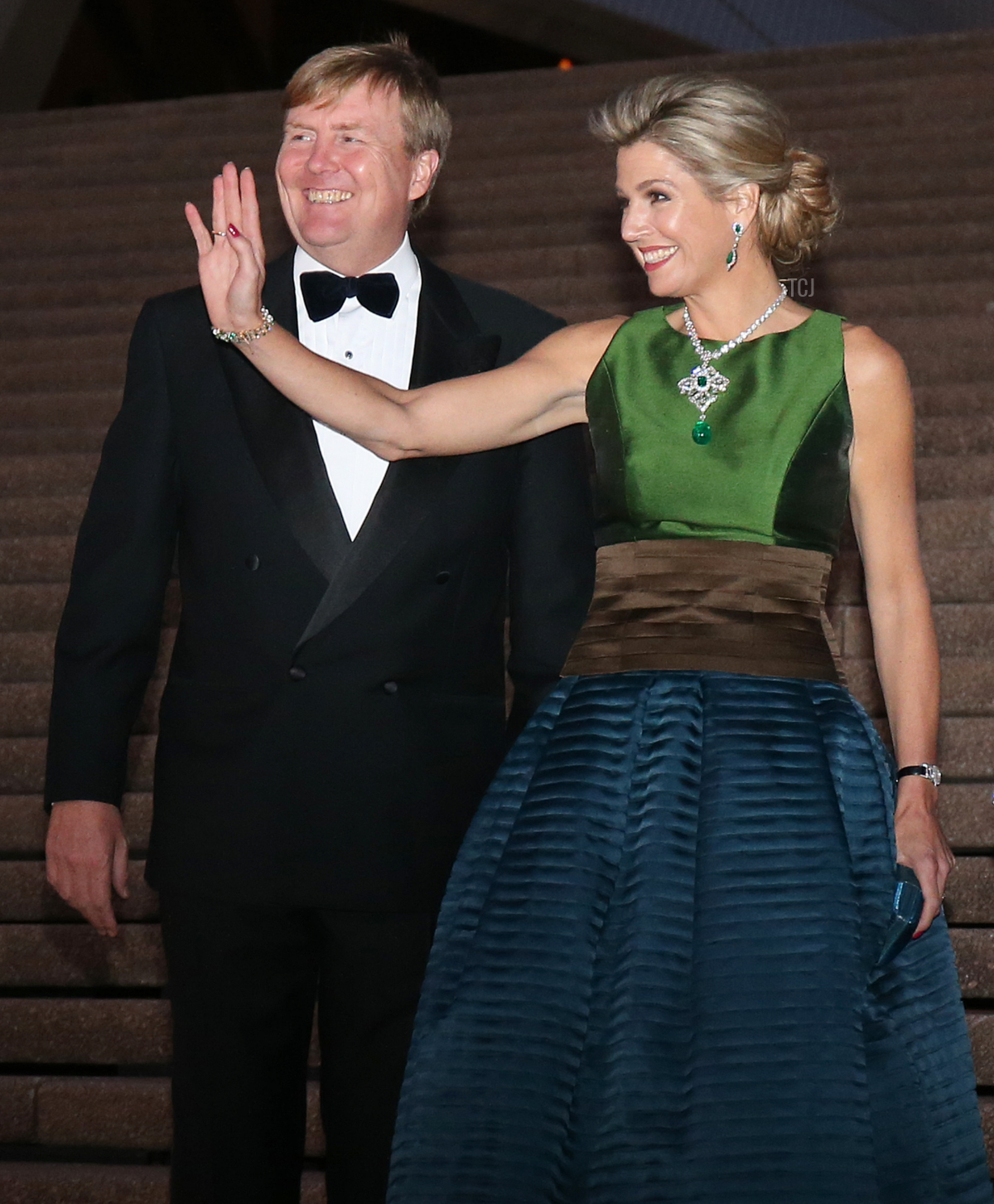 King Willem-Alexander (L) and Queen Maxima (R) of the Netherlands pose for a photograph as they arrive for a concert at the Sydney Opera House in Sydney, on November 2, 2016