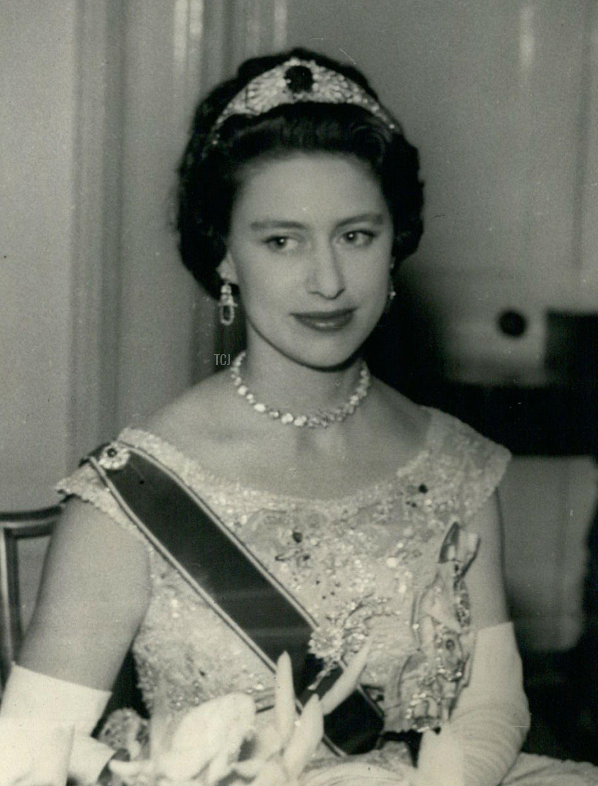 Princess Margaret attends a State Dinner at the Governor General's House, Port of Spain, Trinidad, April 1958