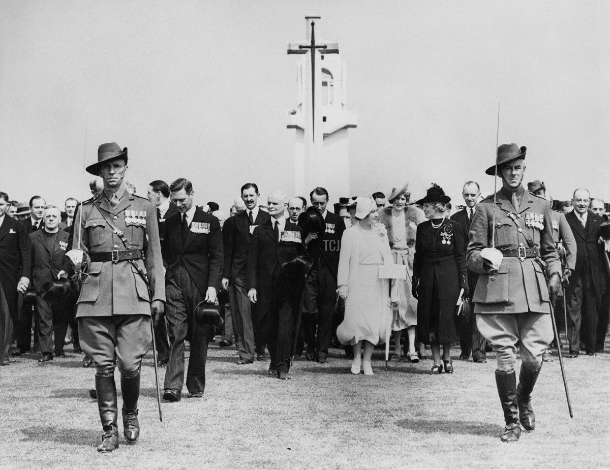 King George VI (1895 - 1952) and Queen Elizabeth (1900 - 2002) unveil the VillersBretonneux Australian National Memorial in the Somme, during their State Visit to France, 22nd July 1938. The Queen is wearing a dress from the White Wardrobe designed for her by Norman Hartnell to mark the death of her mother, the Countess of Strathmore