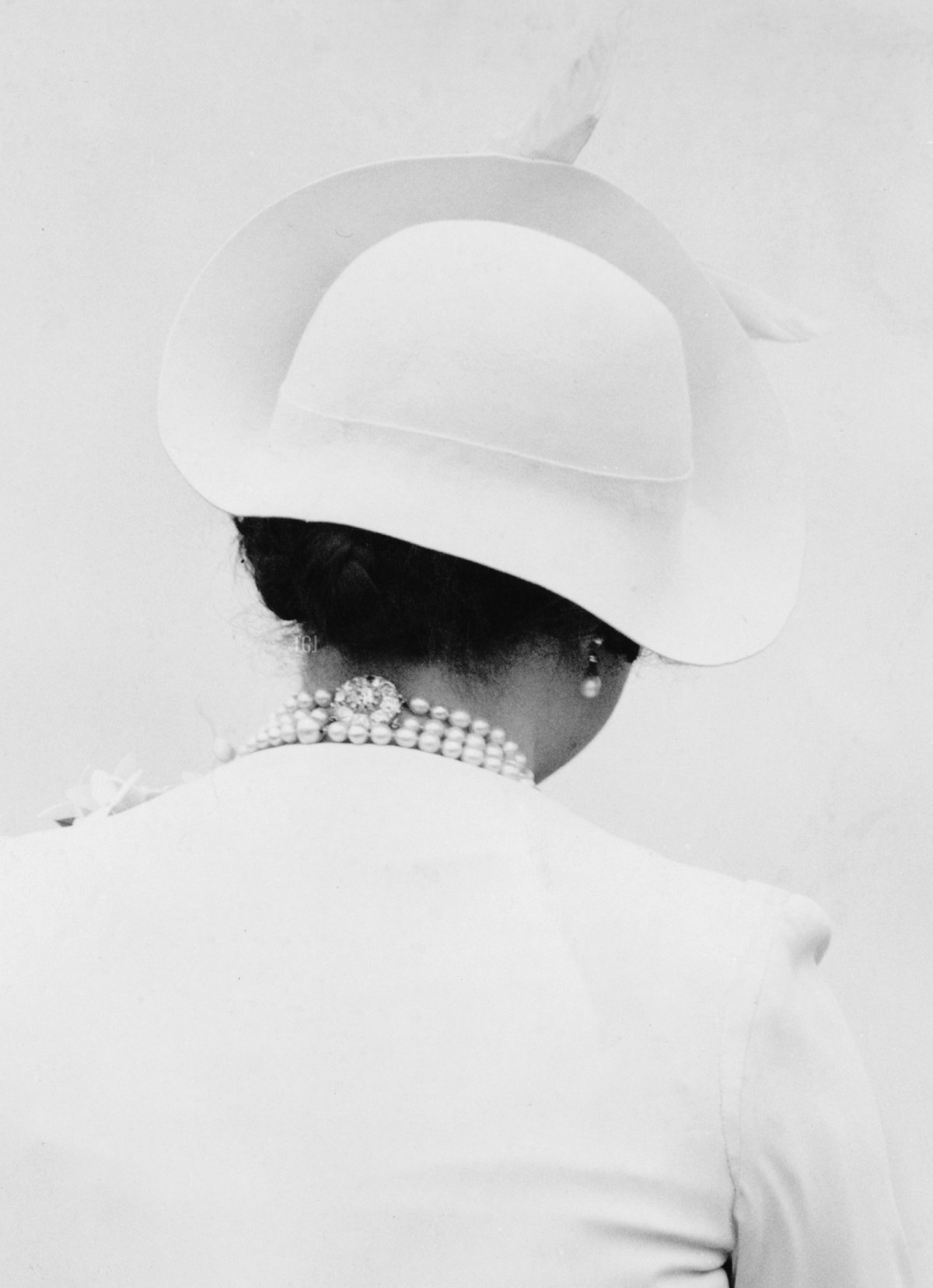 King George VI (1895 - 1952) and Queen Elizabeth (1900 - 2002) unveil the VillersBretonneux Australian National Memorial in the Somme, during their State Visit to France, 22nd July 1938. The Queen is wearing a dress from the White Wardrobe designed for her by Norman Hartnell to mark the death of her mother, the Countess of Strathmore