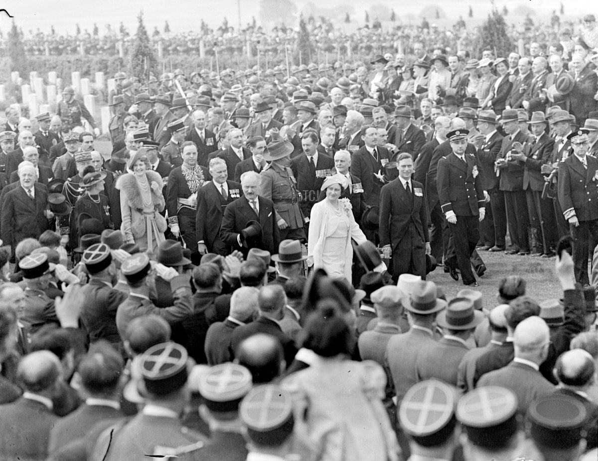 King unveils Australian War Memorial at Villers Bretonneux. The King and Queen attended the last ceremony of their State visit to France, when, in the presence of President Lebrun, his Majesty unveiled the Australian war Memorial at Villers Bretonneux. Photo shows, the King and Queen among Australian ex-servicemen at the service. 22 July 1938