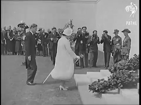 King unveils Australian War Memorial at Villers Bretonneux. The King and Queen attended the last ceremony of their State visit to France, when, in the presence of President Lebrun, his Majesty unveiled the Australian war Memorial at Villers Bretonneux. Photo shows, the King and Queen among Australian ex-servicemen at the service. 22 July 1938