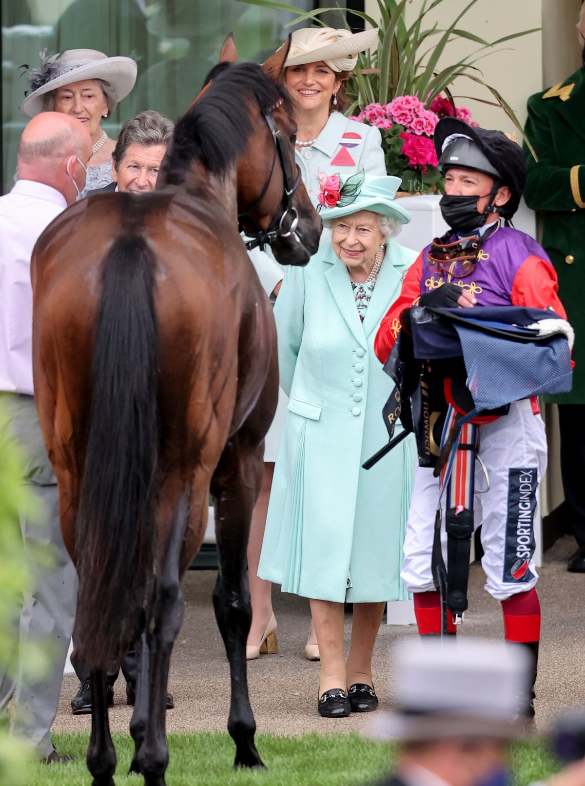 Queen Elizabeth II and Frankie Dettori (R) during Royal Ascot 2021 at Ascot Racecourse on June 19, 2021 in Ascot, England
