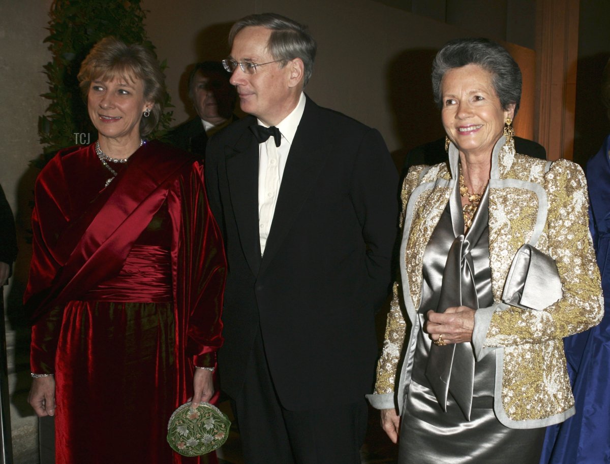 Anne-Aymone Giscard D'estaing (R), Duchess of Gloucester (L) and her husband Duc of Gloucester (C) attend the Child Abuse Foundation Gala at the Castle of Versailles on December 6, 2004 in Versailles, France