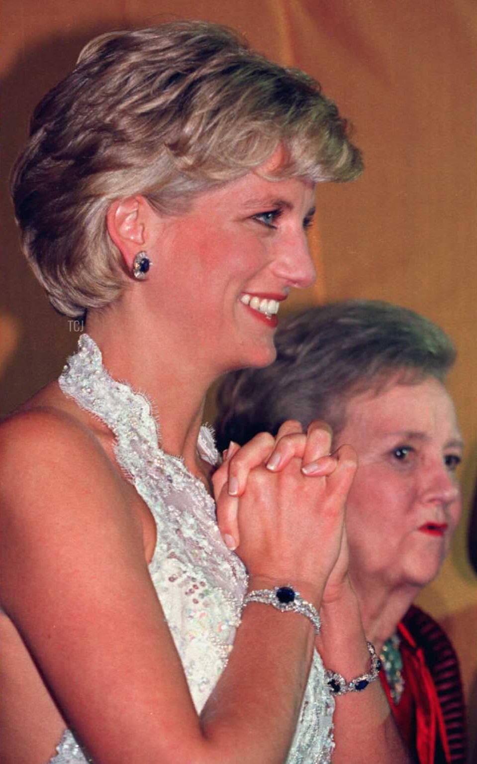 Princess Diana of Wales stands with Washington Post owner Katharine Graham in the receiving line at a multi-million dollar fundraising event for the Nina Hyde Center for Breast Cancer Research late 24 September 1996 in Washington, D.C.