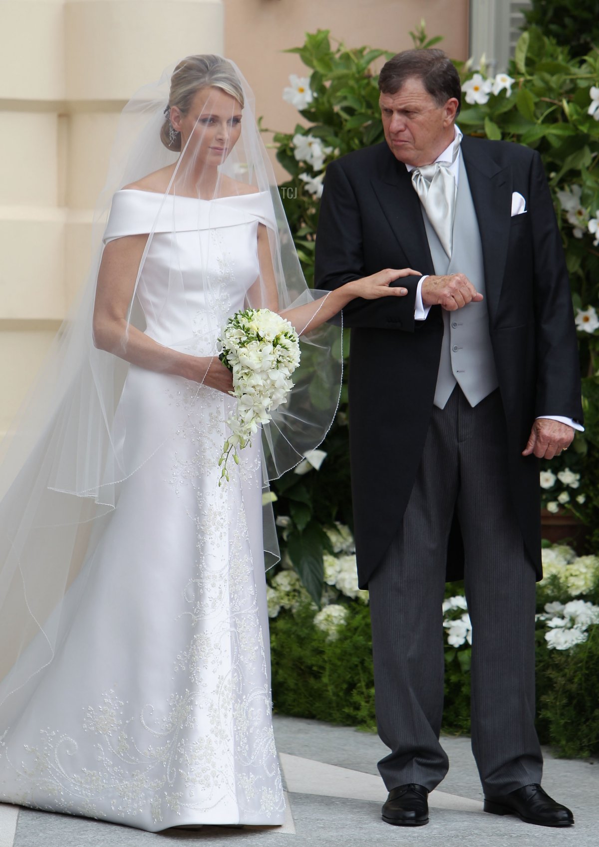 Princess Charlene of Monaco and Michael Kenneth Wittstock arrive at the religious ceremony of the Royal Wedding of Prince Albert II of Monaco to Princess Charlene of Monaco at the Prince's Palace of Monaco on July 2, 2011 in Monaco