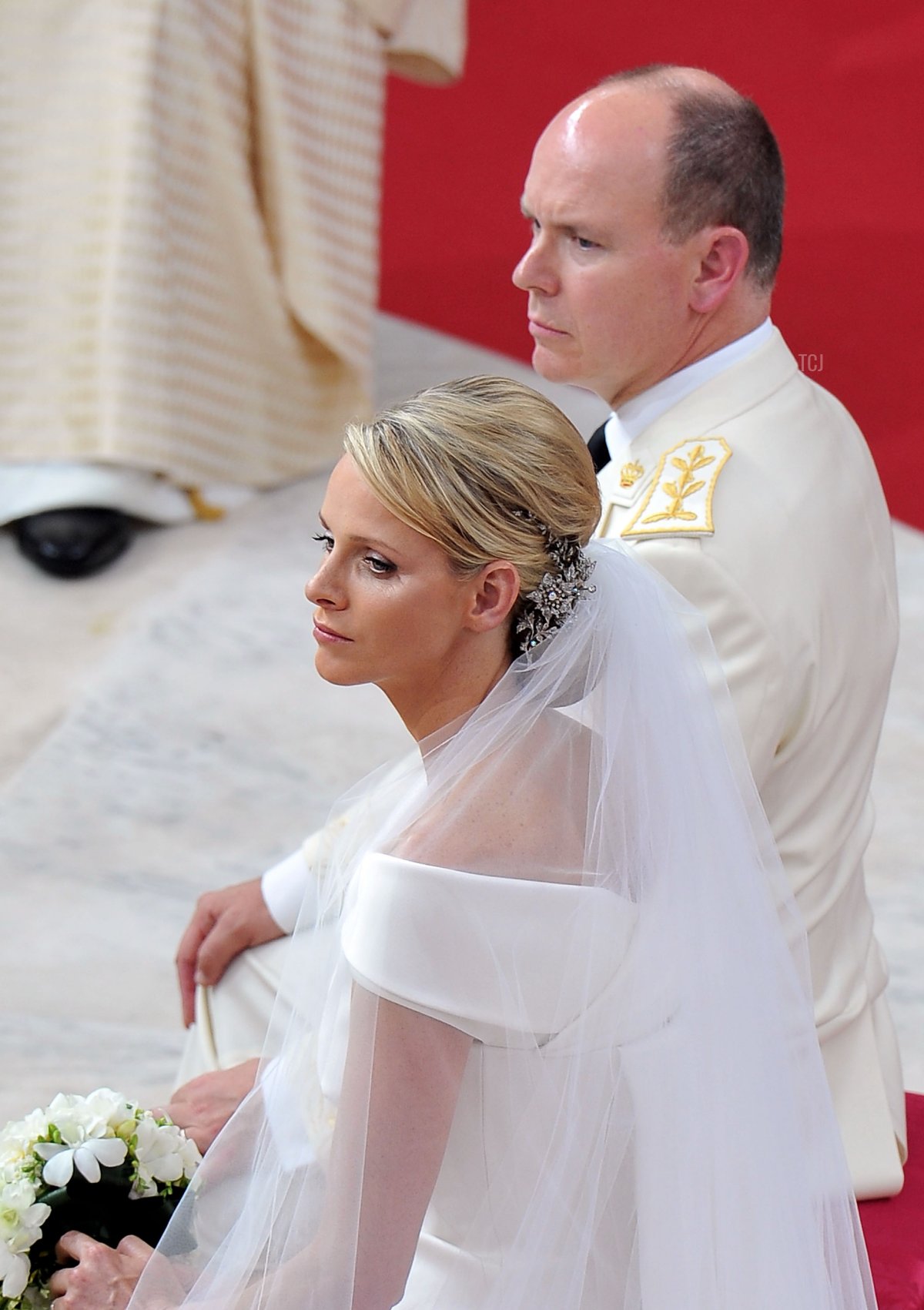 Princess Charlene of Monaco and Prince Albert Of Monaco arrive for the religious ceremony of the Royal Wedding of Prince Albert II of Monaco to Charlene Wittstock in the main courtyard at Prince's Palace on July 2, 2011 in Monaco