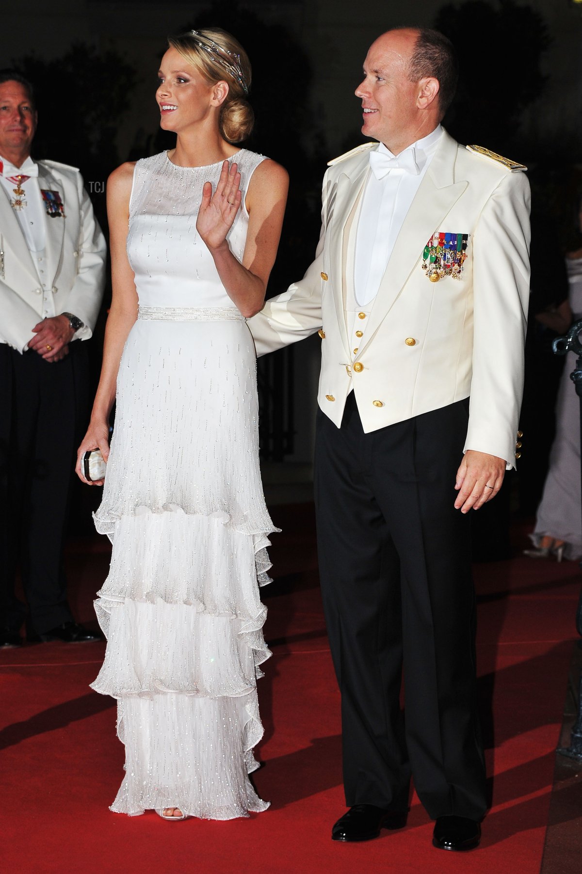 Princess Charlene of Monaco and Prince Albert II of Monaco attend a dinner at Opera terraces after their religious wedding ceremony on July 2, 2011 in Monaco