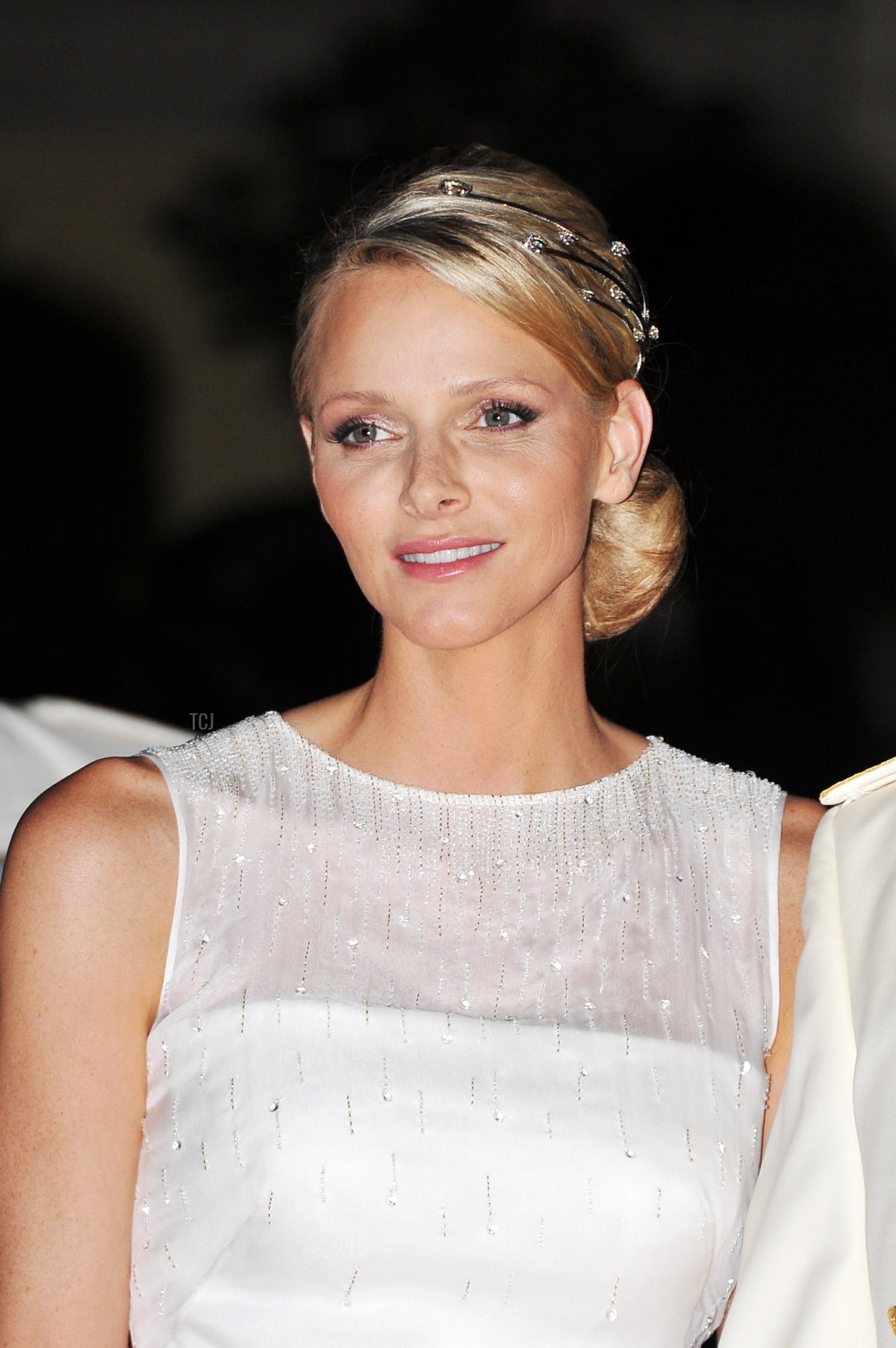 Princess Charlene of Monaco attends a dinner at Opera terraces after their religious wedding ceremony on July 2, 2011 in Monaco