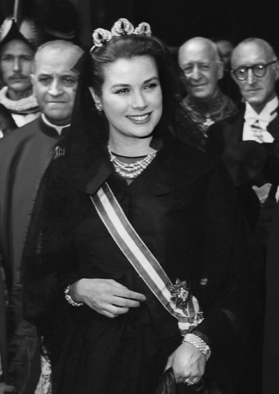 Princess Grace of Monaco wears the Bains de Mer Tiara for a private audience with Pope Pius XII at the Vatican, 30 April 1957