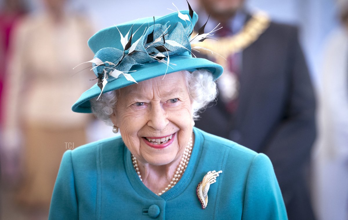 Britain's Queen Elizabeth II gestures during a visit to the Edinburgh Climate Change Institute at the University of Edinburgh in Edinburgh, Scotland on July 1, 2021, as part of her traditional trip to Scotland for Holyrood Week