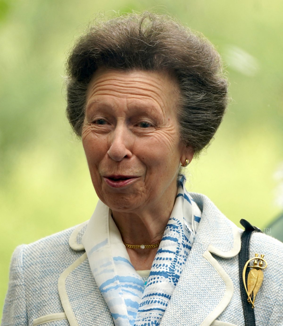 Britain's Princess Anne, Princess Royal gestures during a visit to The Childrens Wood Project in Glasgow on June 30, 2021, as part of her traditional trip to Scotland for Holyrood Week