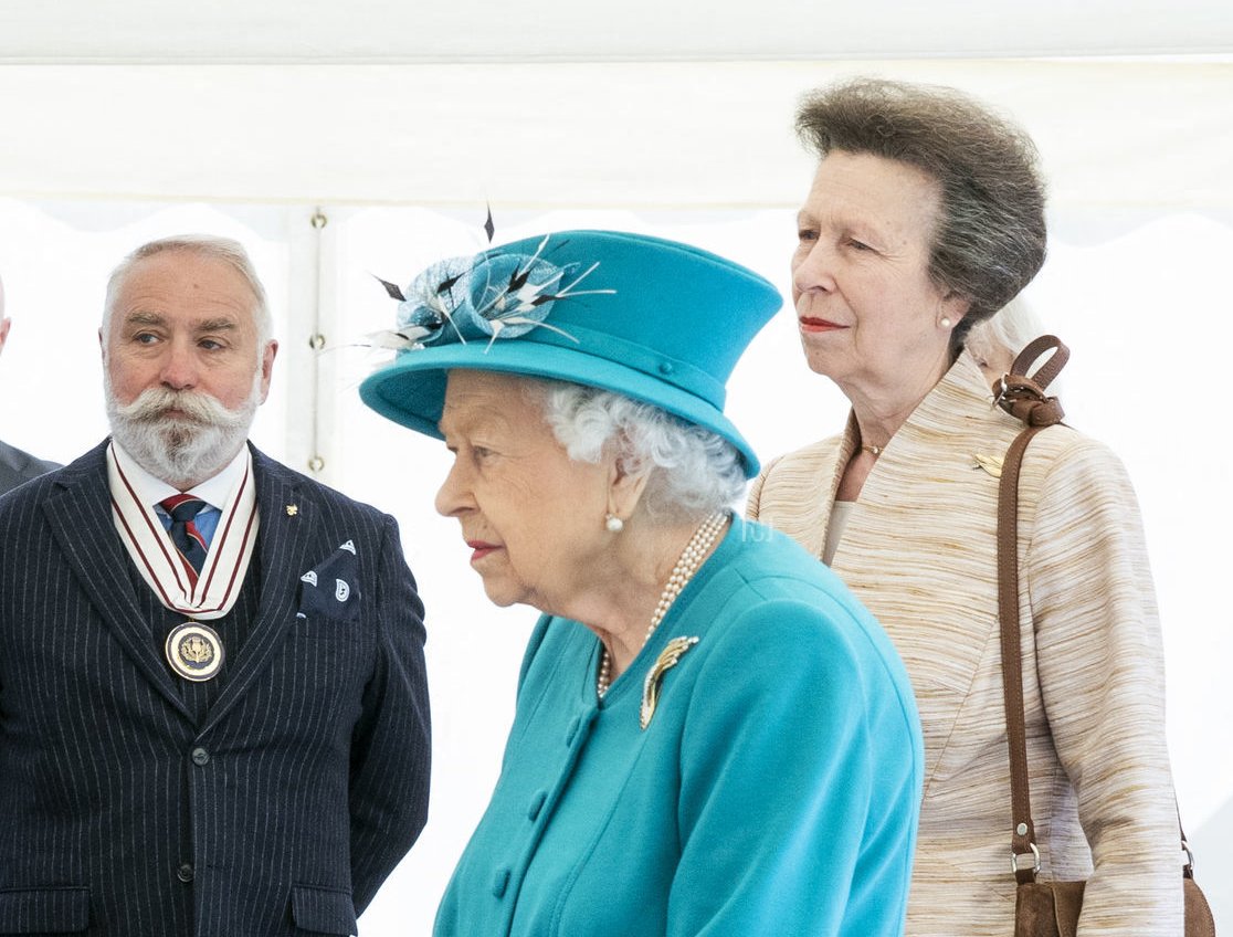 Britain's Queen Elizabeth II and Britain's Princess Anne, Princess Royal are shown a wave energy converter model during a visit to the Edinburgh Climate Change Institute at the University of Edinburgh in Edinburgh, Scotland on July 1, 2021, as part of her traditional trip to Scotland for Holyrood Week