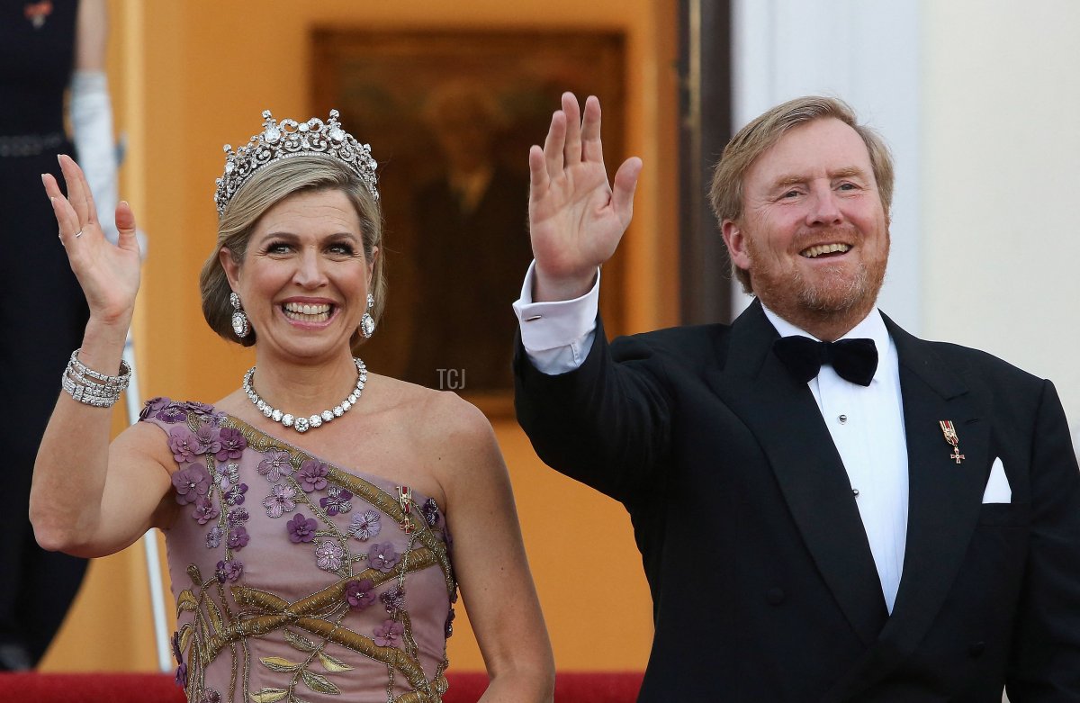 King Willem-Alexander and Queen Maxima of the Netherlands wave as they arrive for a state dinner in their honour at the Bellevue presidential palace in Berlin on July 5, 2021