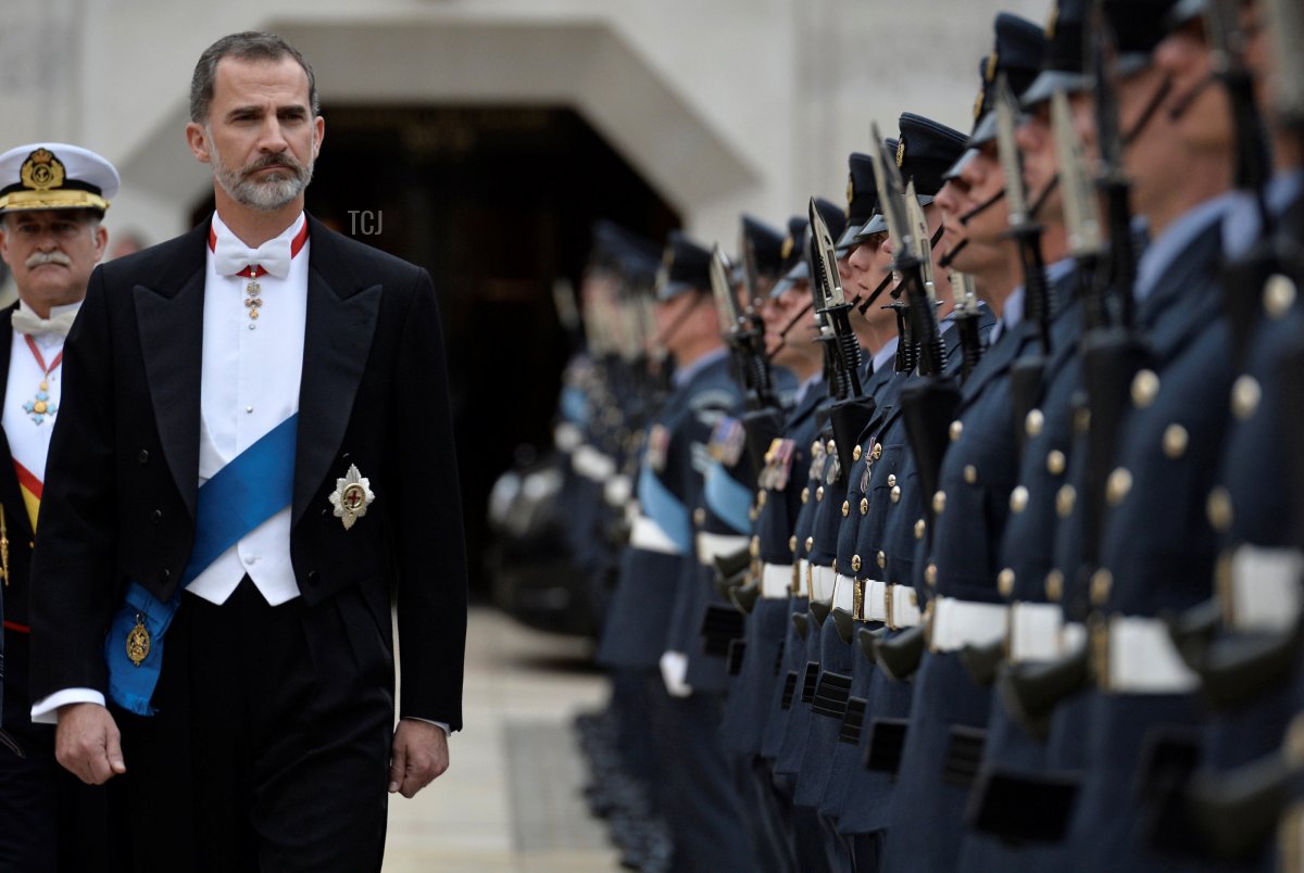 Spanish King Felipe VI inspects a Guard of Honour before a banquet at Guildhall in central London on July 13, 2017, on the second day of the Spanish King and Queen's three-day state visit
