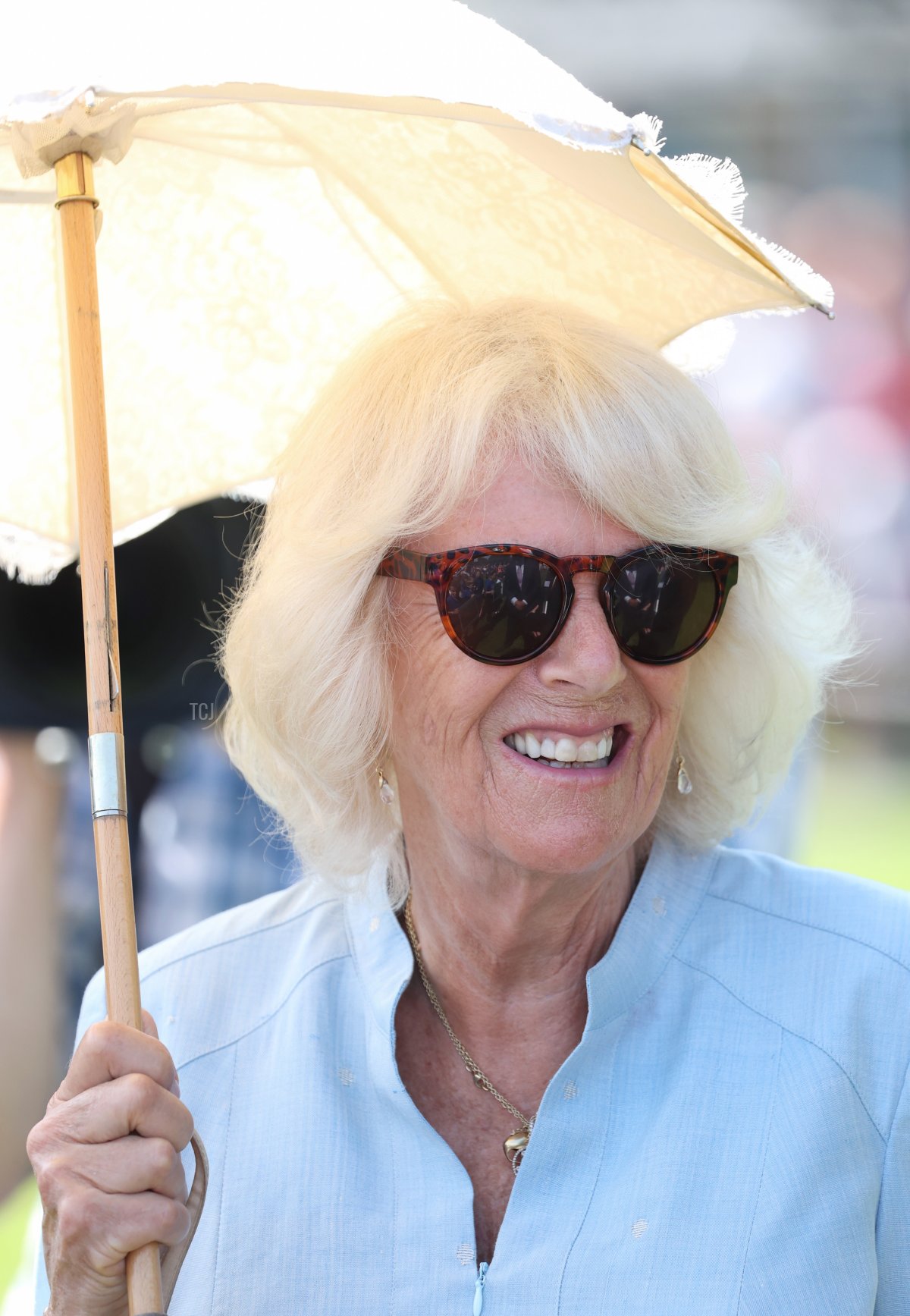 Camilla, Duchess of Cornwall attends a gathering of the town’s community groups and young people in Victoria Park with Prince Charles, Prince of Wales during Day 3 of their visit to Devon and Cornwall on July 21, 2021 in Bideford, England
