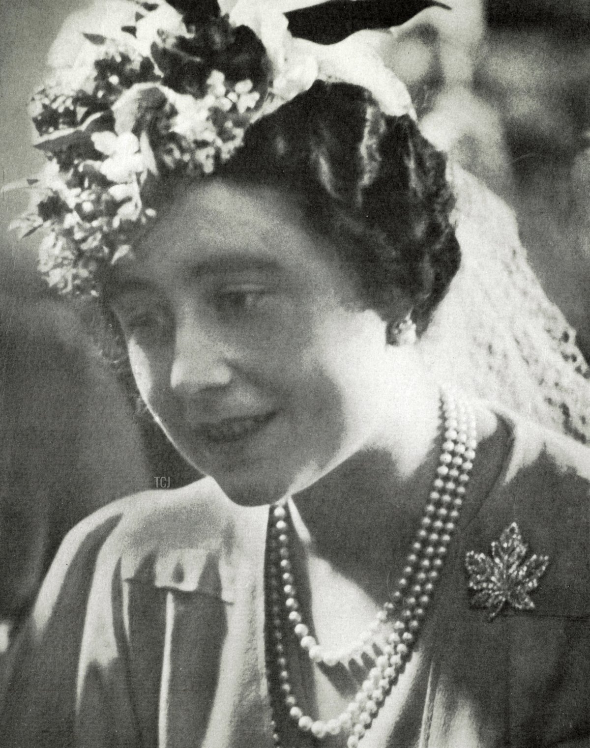 Queen Elizabeth wears the maple leaf brooch given to her by her husband King George VI, to mark their visit to Canada on June, 4, 1939 in Winnipeg