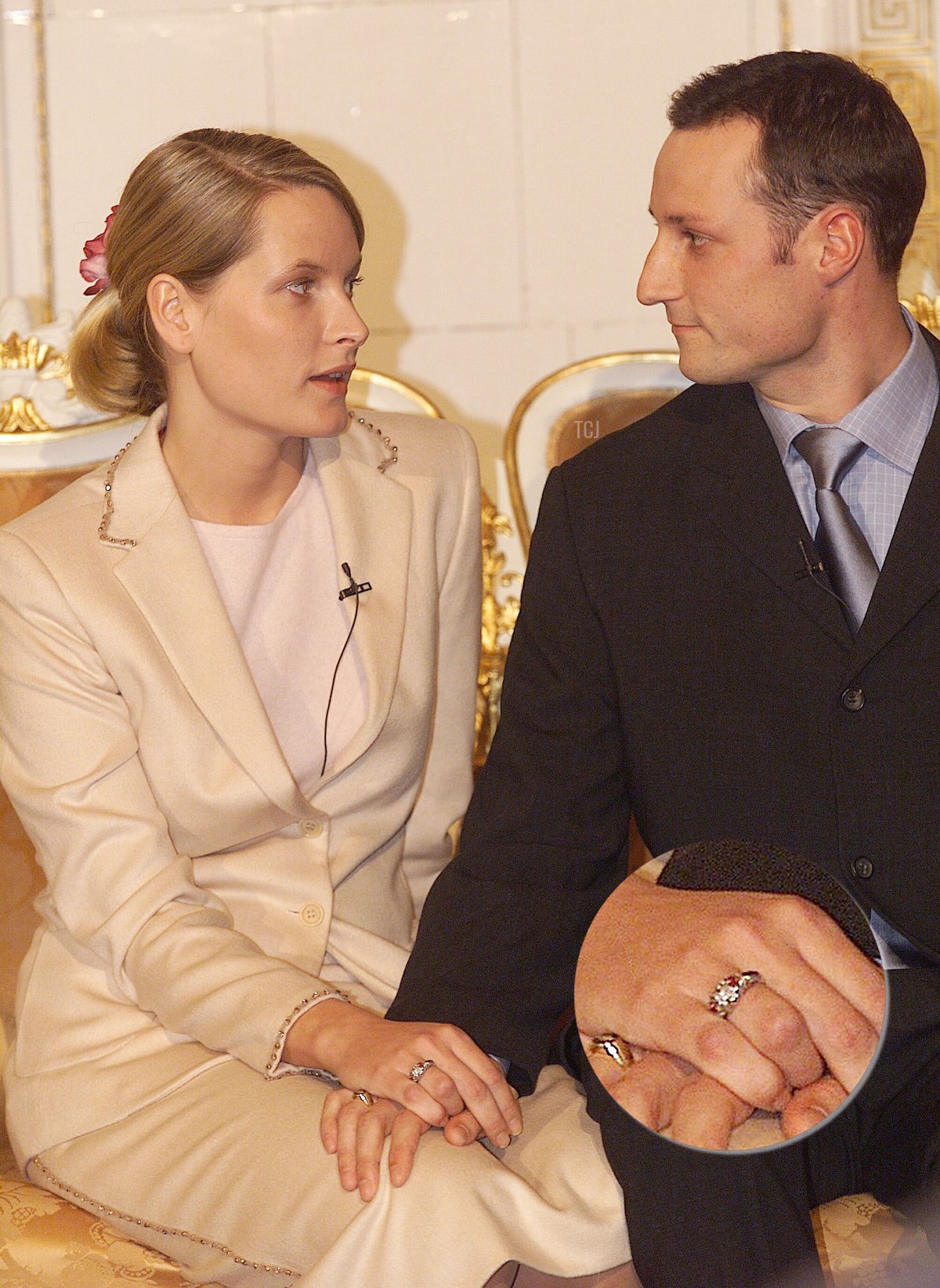 Mette-Marit Tjessem and HRH Crown Prince Haakon Magnus hold hands January 21, 2000 after announcing their engagement in Oslo, Norway