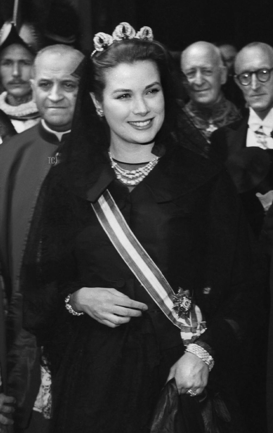 Princess Grace of Monaco wears the Bains de Mer Tiara for a private audience with Pope Pius XII at the Vatican, 30 April 1957