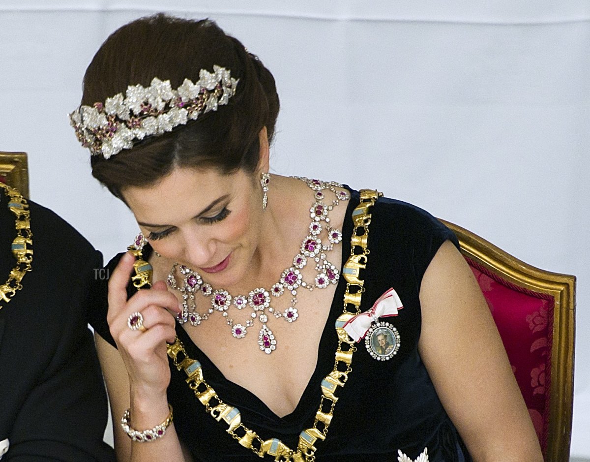 Danish Crown Princess Mary (R) and King Konstantin attend the Gala Dinner in Christiansborg Castle on the occasion of Danish Queen Margrethe's 40th jubilee on January 15, 2012