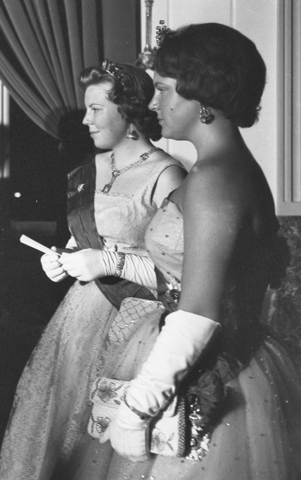 Princess Beatrix and Princess Irene of the Netherlands attend a gala during the Belgian state visit, July 1959