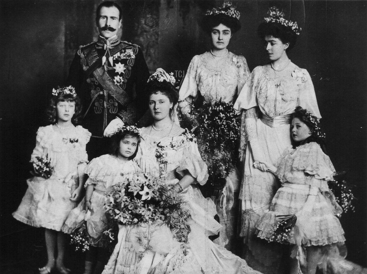 The wedding of Prince Alexander and Princess Alice, later Earl and Countess Athlone, in a posed portrait with their bridesmaids, February 10th 1904