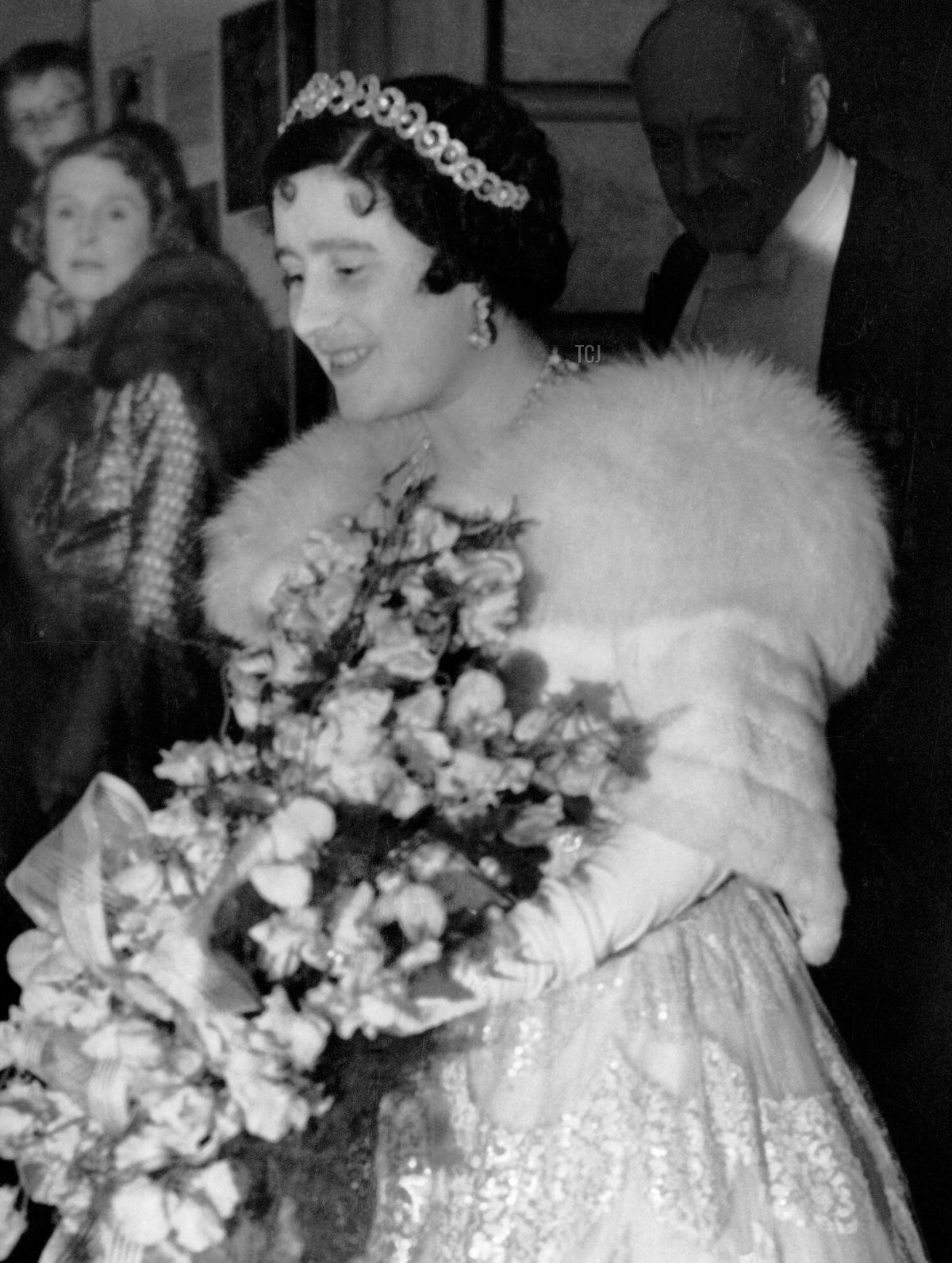 Queen Elizabeth of the United Kingdom (later the Queen Mother) wears the Teck Hoop Necklace Tiara for a performance by the Sadler’s Wells Ballet School, May 1938
