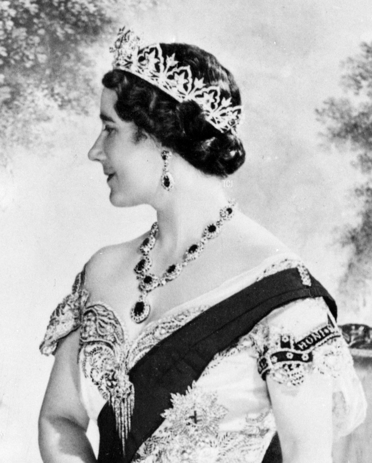 Queen Elizabeth, the former Duchess of York smiles as she poses in 1937 for official picture in London after the Coronation 12 May 1937 of the Duke of York