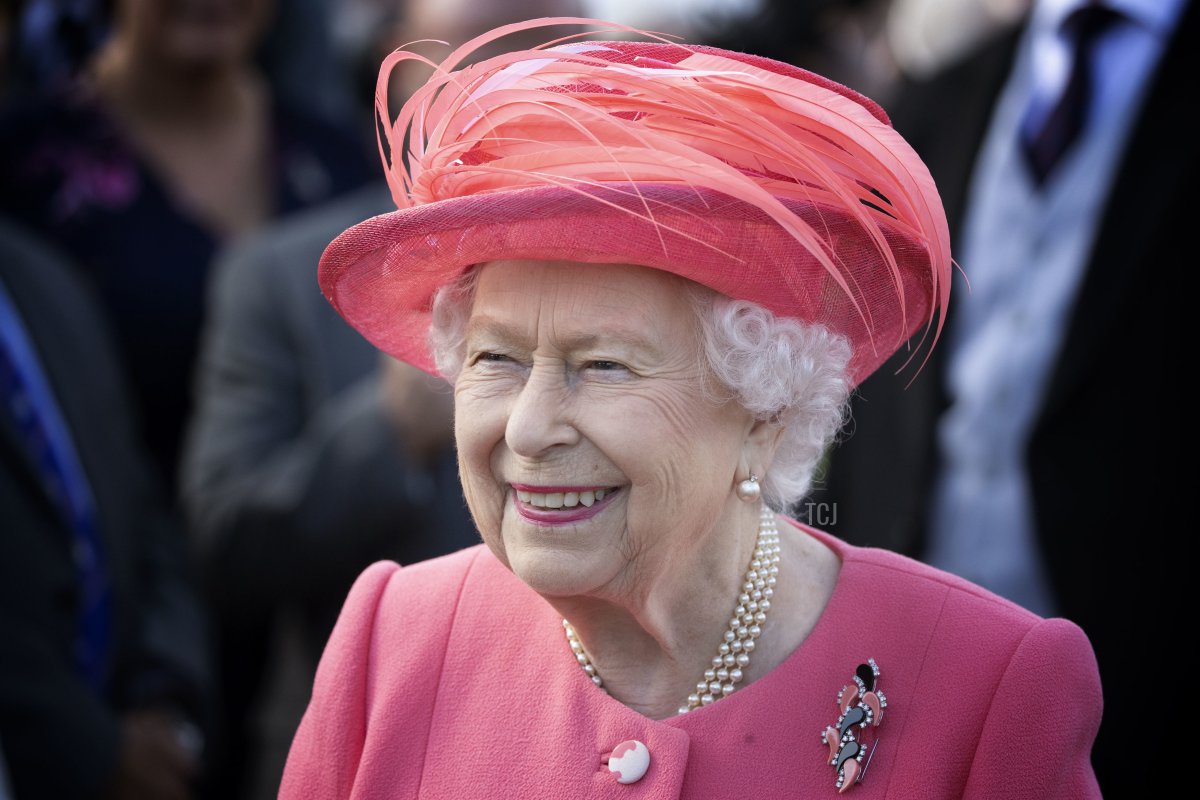 Britain's Queen Elizabeth II attends a garden party at the Palace of Holyroodhouse in Edinburgh on July 3, 2019