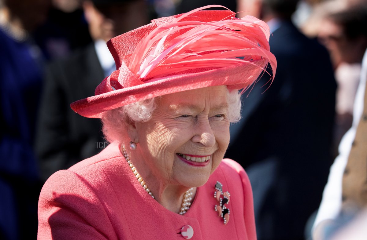 Britain's Queen Elizabeth II attends a garden party at the Palace of Holyroodhouse in Edinburgh on July 3, 2019