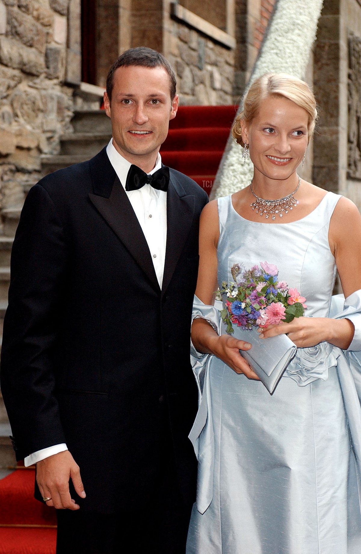 Crown Prince Haakon of Norway and his fiancee Mette-Marit Tjessem Hoiby arrive for a dinner at Akershus Castle in Oslo August 24, 2001 on the eve of their wedding