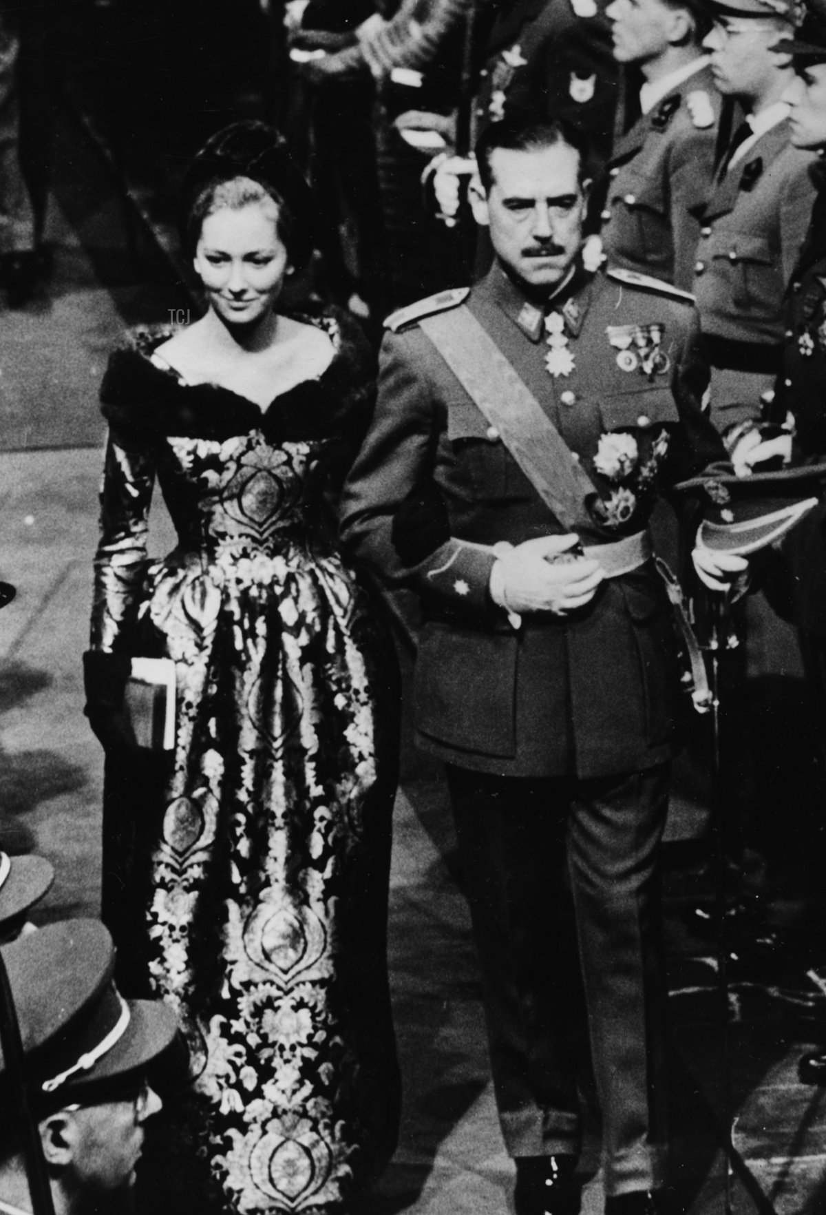Princess Paola of Belgium and the Marquis Of Aguilar leaving the Collegiate Church of St Michel and Gudule arm in arm, following the wedding of King Baudouin of Belgium, Brussels, December 16th 1960