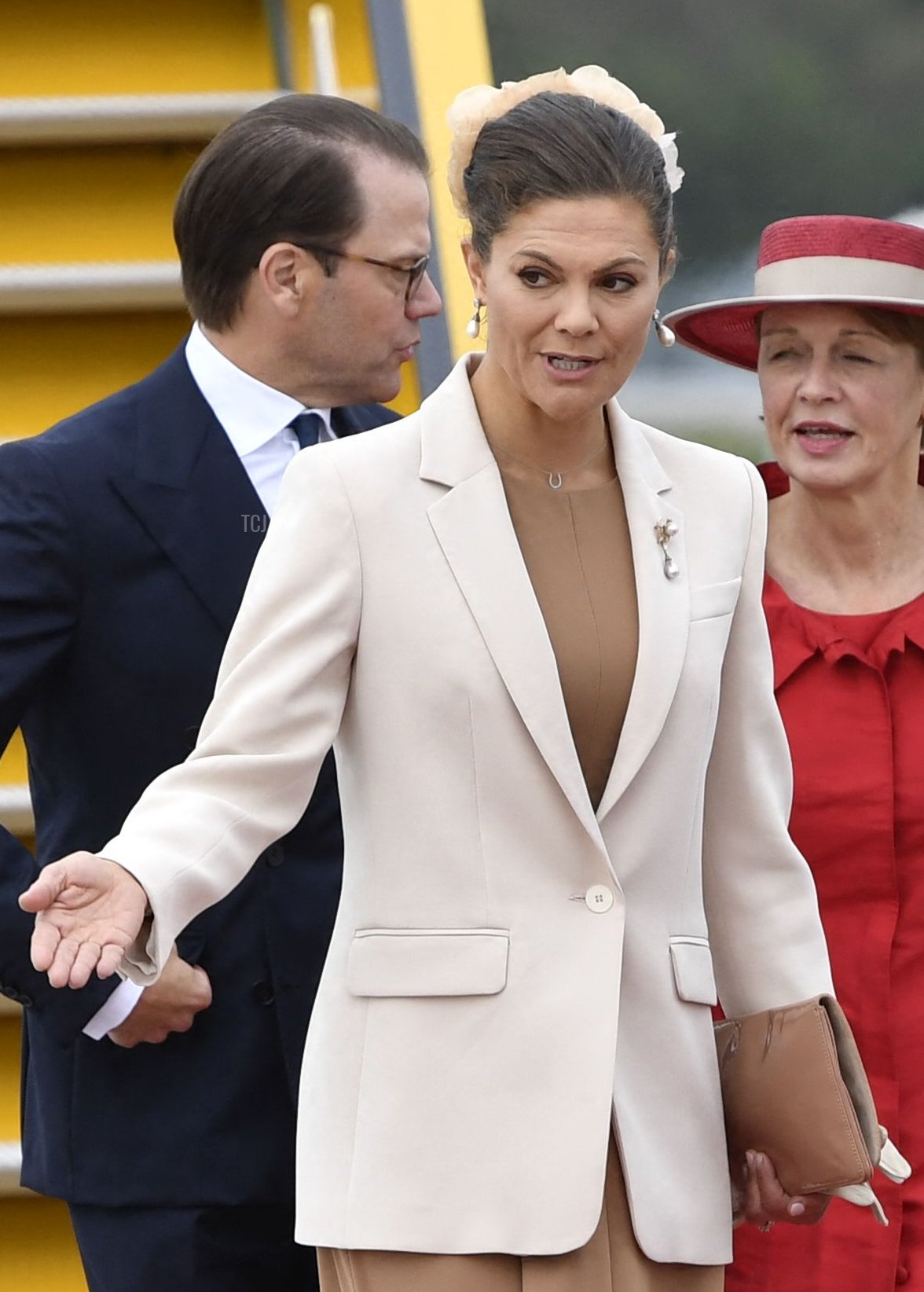 German President Frank-Walter Steinmeier (R) and his wife wife Elke Buedenbender (2nd R) are received by Sweden's Crown Princess Victoria (2nd L) and Prince Daniel (L) at Arlanda airport outside Stockholm, on September 7, 2021