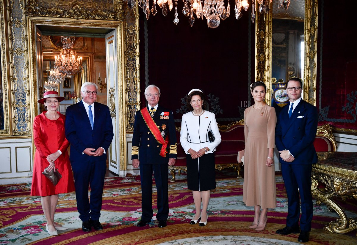 Wife of German President Elke Buedenbender, German President Frank-Walter Steinmeier, Sweden's King Carl Gustaf, Queen Silvia, Crown Princess Victoria and Prince Daniel pose for a picture during a welcoming ceremony at the Royal Palace in Stockholm, on September 7, 2021