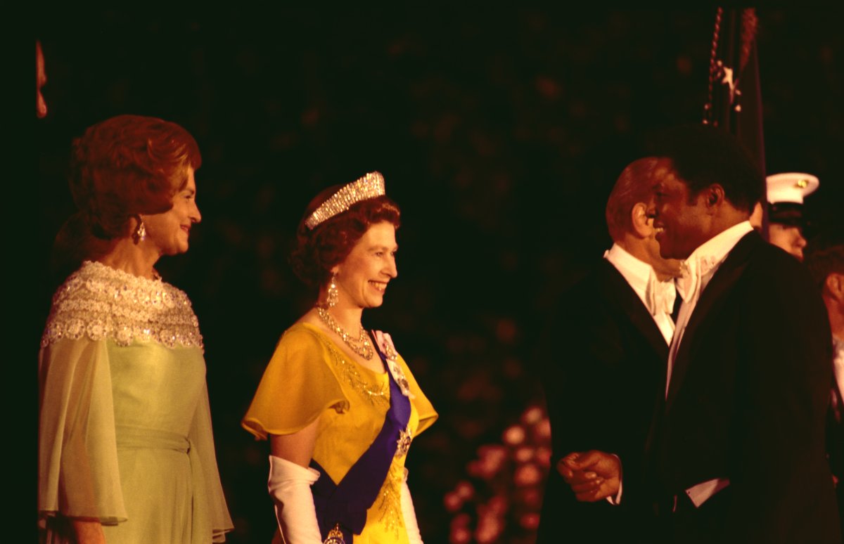 First Lady Betty Ford and Queen Elizabeth II of Great Britain Greeting Baseball Player Willie Mays in the Receiving Line on the South Driveway of the White House Prior to a State Dinner Honoring Her Majesty and Prince Philip
