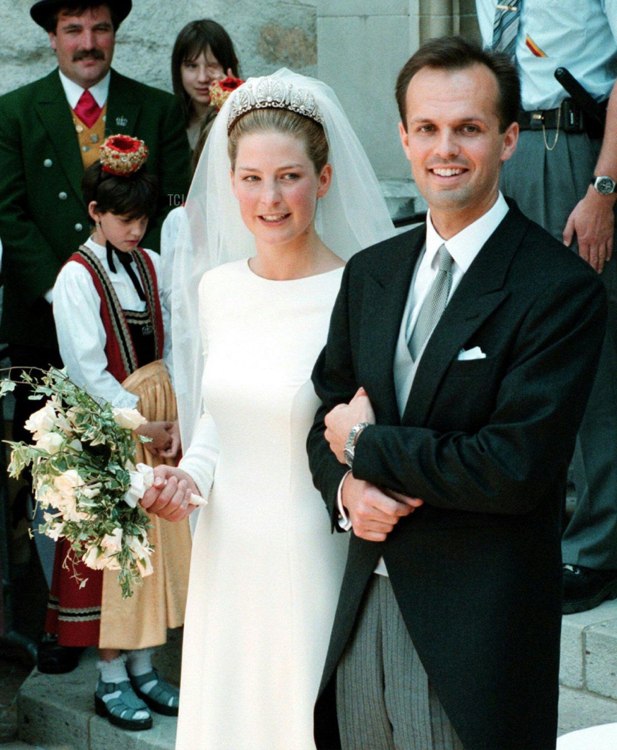 Princess Tatjana of Liechtenstein (L) and German businessman Philipp von Lattorff leave the cathedral in Vaduz after their wedding June 5, 1999