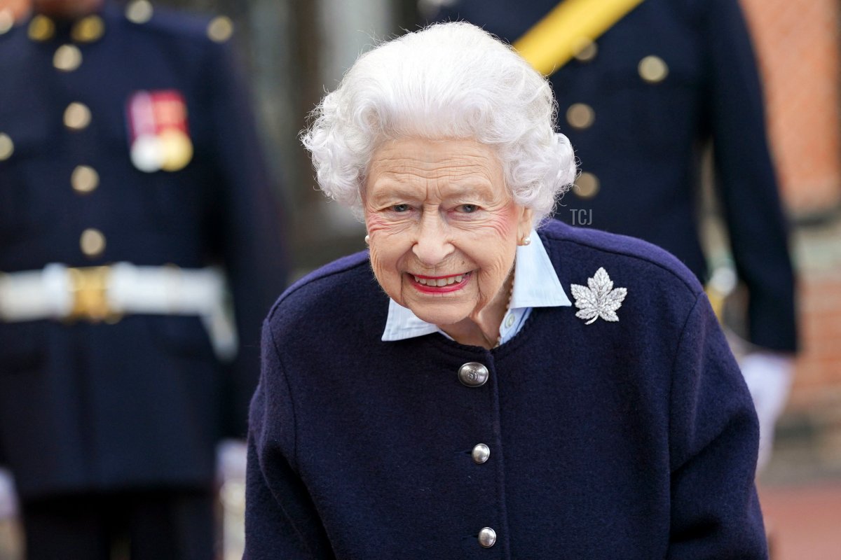 Britain's Queen Elizabeth II gestures as she meets members of the Royal Regiment of Canadian Artillery to mark the 150th Anniversary of the foundation of A and B Batteries, at Windsor Castle, Windsor on October 6, 2021