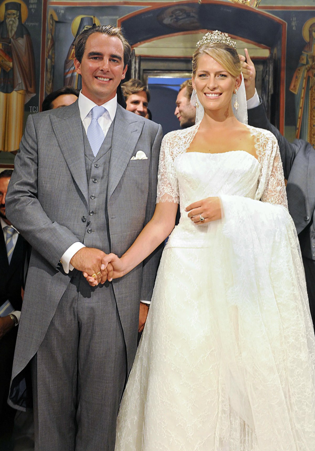 Prince Nikolaos of Greece and Tatiana Blatnik pose during their wedding ceremony in Saint Nicolas church at the island of Spetses on August 25, 2010