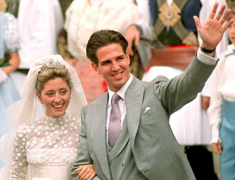 Prince Pavlos, (R), heir to the Greek throne in exile, and his bride Marie-Chantal Miller, daughter of American-born businessman Robert W. Miller, wave after their wedding ceremony at the Greek Orthodox St Sophia's Cathedral in London 01 July 1995