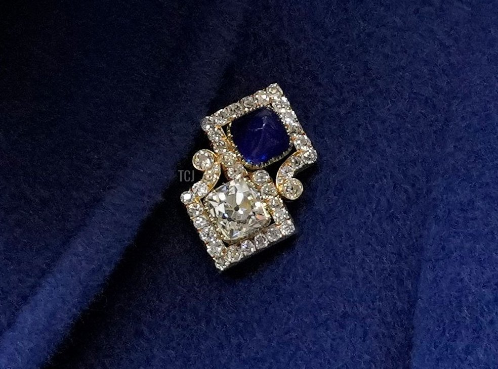 Britain's Queen Elizabeth II smiles as she leaves after attending a Service of Thanksgiving to mark the Centenary of the Royal British Legion at Westminster Abbey in London on October 12, 2021