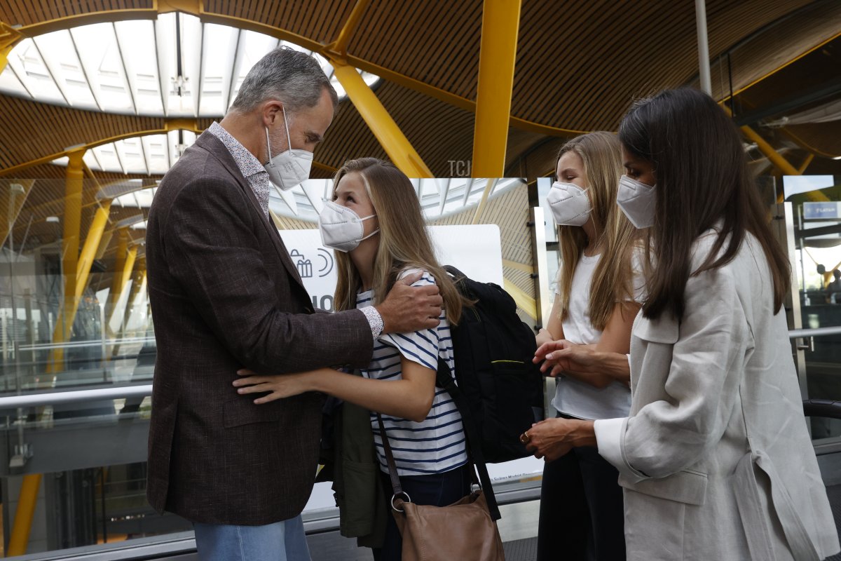 In this handout image provided by the Royal Household, Crown Princess Leonor of Spain says goodbye to her parents King Felipe VI of Spain, Queen Letizia of Spain and sister Princess Sofia of Spain at the Madrid airport before traveling to Wales to start her school year at UWC Atlantic College on August 30, 2021 in Madrid, Spain