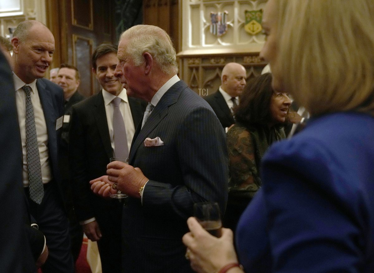 Prince Charles, Prince of Wales greets guests during a reception for international business and investment leaders at Windsor Castle to mark the Global Investment Summit on October 19, 2021 in Windsor, England